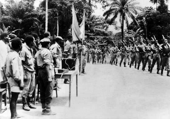 Rebels parade in 1967 in an unlocated place of Angola during the Angolan War of Independence (1961Â–1975). (Photo credit should read STF/AFP/Getty Images)