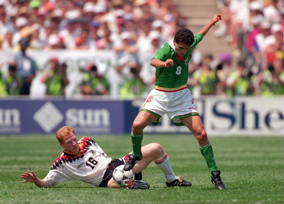 17 JUN 1994:  GERMANY''S MATTHIAS SAMMER TACKLES BOLIVIA''S JOSE MELGAR DURING THE OPENING OF THE 1994 WORLD CUP AT SOLDIER FIELD IN CHICAGO, ILLINOIS. GERMANY WON THE MATCH 1-0.   Mandatory Credit: Dave Cannon/ALLSPORT