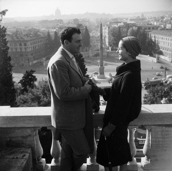 November 1956:  Two lonely hearts meet in Rome. They both frequent the Cafe Canova where the manager Omero Benfanati works in cooperation with a marriage agency. He places tiny photographs of young men and women anxious to find a life's partner in boxes of chocolates sold at the cafe.  (Photo by Enzo Graffeo/BIPs/Getty Images)