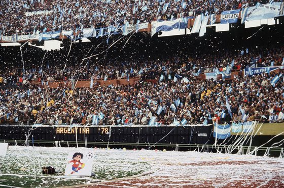 BUENOS AIRES, ARGENTINA - JUNE 25:  Argentinian fans throw rolls of paper all over the stadium as they wait for the start of the World Cup final between Argentina and the Netherlands 25 June 1978 in Buenos Aires. AFP PHOTO  (Photo credit should read STAFF/AFP/Getty Images)