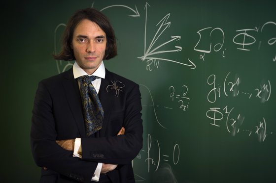 French mathematician Cedric Villani, author of the novel entitled "Theoreme vivant" poses on September 25, 2012 at the Henri Poincare Institut in Paris. Villani, professor at Lyon University and director of Henri Poincare Institut since 2009, received the Fields Medal (International Medal for Outstanding Discoveries in Mathematics) in 2010.  AFP PHOTO / JOEL SAGET        (Photo credit should read JOEL SAGET/AFP/GettyImages)