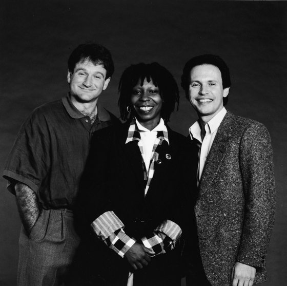 Promotional studio portrait of American comedians and Robin Williams, Whoopi Goldberg and Billy Crystal, the hosts of the 'Comedy Relief' variety benefit special, 1986.  (Photo by HBO/Getty Images)