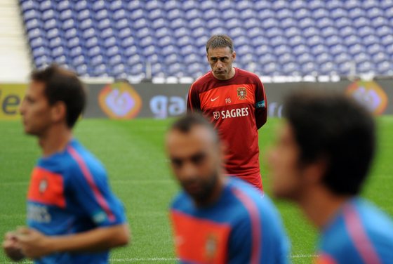 Portugal's coach Paulo Bento (top) looks on as his players train at Dragao Stadium in Porto on October 7, 2010, on the eve of their EURO 2010 qualifyer football match against Denmark. AFP PHOTO/ FRANCISCO LEONG (Photo credit should read FRANCISCO LEONG/AFP/Getty Images)