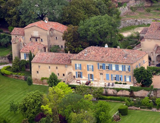 (FILES) A file picture taken on May 31, 2008 in Le Val, southeastern France, shows an aerial view of the Chateau Miraval, a vineyard estate then owned by US businessman Tom Bove, and bought in 2008 by US actors Brad Pitt and Angelina Jolie. The French weekly business newspaper Challenges reported on February 13, 2013 that Pitt and Jolie had decided to take over the exploitation of their vineyard from an outsourced company, in partnership for the grape growing and the winemaking of their 500-hectare wine estate with Marc Perrin and his family -- who produce such wines as Cote du Rhone, Chateauneuf du Pape and Gigondas. The Chateau Miraval wine estate produces wines from Cotes de Provence and Coteaux-Varois-en-Provence. AFP PHOTO MICHEL GANGNE (Photo credit should read MICHEL GANGNE/AFP/Getty Images)