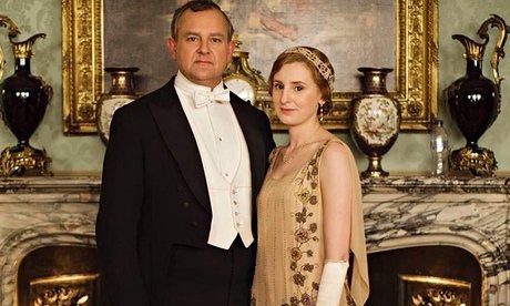Downton Abbey promotional picture for fifth series, with modern bottle of water on mantelpiece