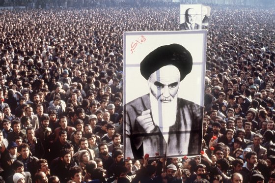 Demonstrators hold a poster of Ayatollah Ruhollah Khomeini, in January 1979, in Teheran, during a demonstration against the shah.        (Photo credit should read /AFP/Getty Images)