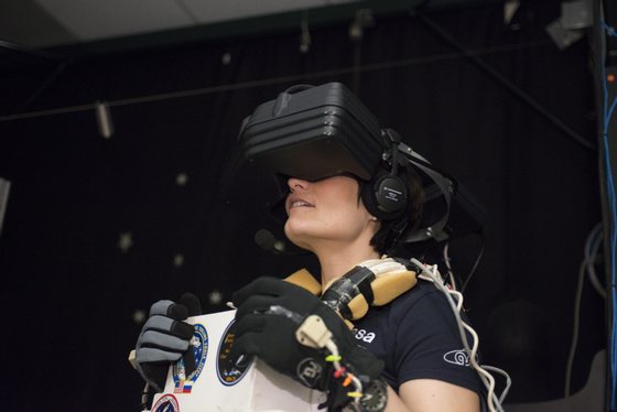 ESA astronaut Samantha Cristoforetti using the virtual reality hardware to rehearse some of her duties for a mission to the International Space Station, at NASA's Johnson Space Center, on 30 June 2014. Samantha Cristoforetti is assigned to fly on the Soyuz TMA-15M spacecraft to the ISS, scheduled for November 2014 and as part of Expedition 42/43.