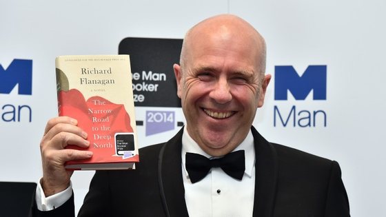 Australian author Richard Flanagan poses for pictures after winning the 2014 Man Booker Prize for his book "The Narrow Road to the Deep North" in Central London on October 14, 2014. AFP PHOTO/BEN STANSALL        (Photo credit should read BEN STANSALL/AFP/Getty Images)