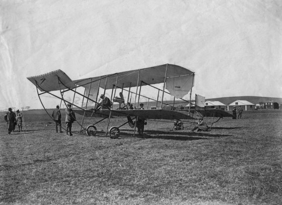 English motoring and aviation pioneer Charles Rolls (1877 - 1910) in his French-built Sommer 1910 biplane, at Eastchurch airfield on the Isle of Sheppey in Kent, 2nd April 1910. (Photo by Topical Press Agency/Hulton Archive/GettyImages)