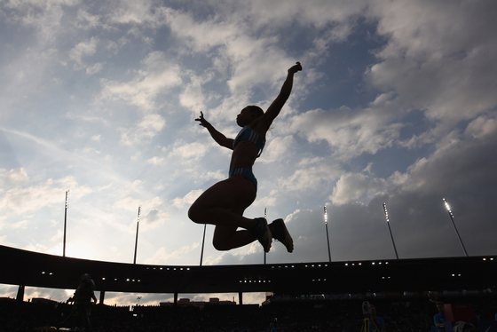 ZURICH, SWITZERLAND - AUGUST 19:  Naide Gomes of Portugal competes during the women's long jump during the Iaaf Diamond League meeting at the Letzigrund Stadium on August 19, 2010 in Zurich, Switzerland.  (Photo by Michael Steele/Getty Images)