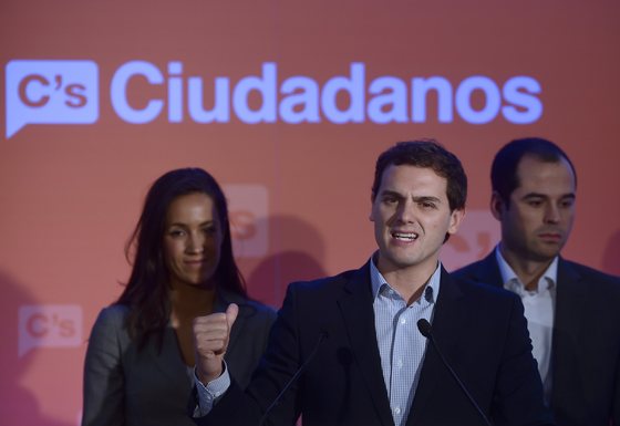 President of Ciudadanos (Citizens) Albert Rivera (C) speaks during the presentation of candidate for  municipal and regional elections Begona Villacis (L) and Ignacio Aguado (R) in Madrid on March 2, 2015. AFP PHOTO / PIERRE-PHILIPPE MARCOU        (Photo credit should read PIERRE-PHILIPPE MARCOU/AFP/Getty Images)