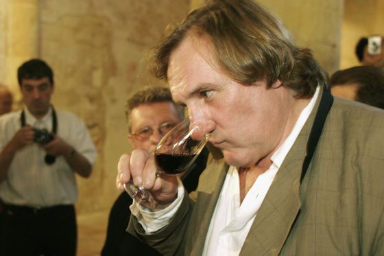 ANIANE, FRANCE - MAY 23: Actor Gerard Depardieu (along with his partner Bernard Magrez) presents his new 2004 vin de garage vintage wine called "Le bien decide" at his 3 hectare vineyard "Coteaux du Languedoc" in Aniane, near Montpellier, on May 23, 2005 in Aniane, France. (Photo by Pascal Parrot/Getty Images)