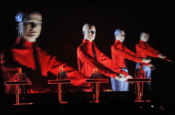 NEW YORK, NY - APRIL 10:  (L-R) Ralf HÃ¼tter, Henning Schmitz, Fritz Hilpert, and Stefan Pfaffe of the band Kraftwerk perform during the Kraftwerk - Retrospective 1 2 3 4 5 6 7 8, Autobahn (1974) at The Museum of Modern Art on April 10, 2012 in New York City.  (Photo by Mike Coppola/Getty Images)