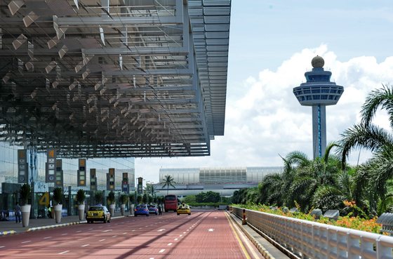 This photograph taken on May 9, 2012 shows the departure hall entrance of Singapore's Changi international airport terminal 3.  Singapore's Changi Airport handled 4.28 million passengers in March, up 15.3 per cent from a year ago.  AFP PHOTO/ROSLAN RAHMAN        (Photo credit should read ROSLAN RAHMAN/AFP/GettyImages)