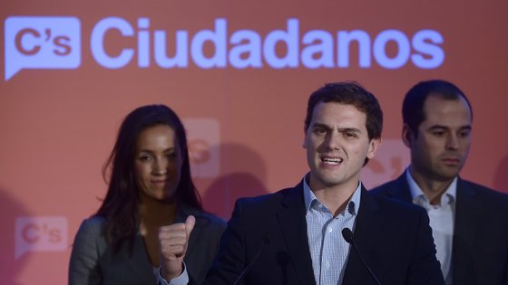 President of Ciudadanos (Citizens) Albert Rivera (C) speaks during the presentation of candidate for municipal and regional elections Begona Villacis (L) and Ignacio Aguado (R) in Madrid on March 2, 2015. AFP PHOTO / PIERRE-PHILIPPE MARCOU (Photo credit should read PIERRE-PHILIPPE MARCOU/AFP/Getty Images)