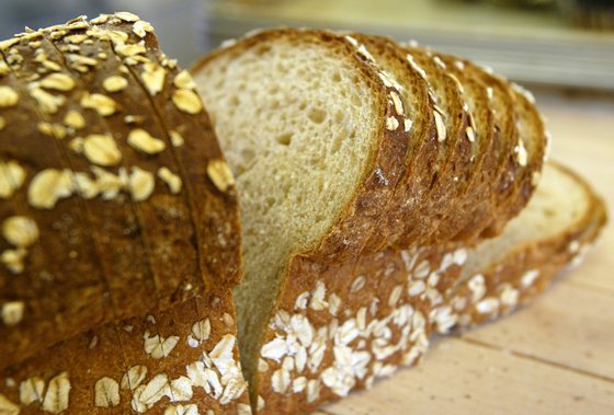 SAN FRANCISCO - NOVEMBER 21 :  A loaf of sliced wheat bread is seen on the shelf at the Noe Valley Bakery and Bread Co. November 21, 2003 in San Francisco, California. The popularity of Atkins-style, low carbohydrate diets has contributed to the drop in consumption of bread in the U.S. over the past year as 40 percent of Americans ate less than in 2002.  (Photo by Justin Sullivan/Getty Images)  While industry leaders said The popularity of Atkins-style low-carbohydrate diets hasnt significantly affected sales for most bakers and suppliers, they said the trend may mean new ways of doing business.