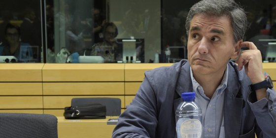 Newly appointed Greek Finance Minister Euclid Tsakalotos looks on during a Eurogroup meeting ahead of a Eurozone Summit meeting at the EU headquarters in Brussels on July 7, 2015. AFP PHOTO/ JOHN THYS (Photo credit should read JOHN THYS/AFP/Getty Images)