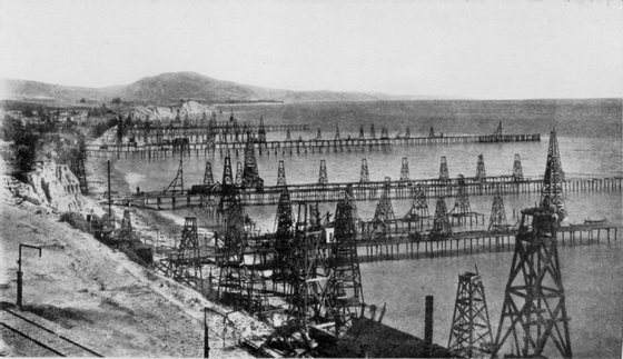 Oil_wells_just_offshore_at_Summerland,_California,_c.1915