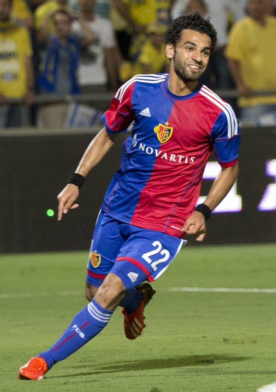 Switzerland's FC Basel midfielder Mohamed Sala celebrates after scoring against Maccabi Tel Aviv FC at the Bloomfield stadium in the coastal city of Tel Aviv on August 6, 2013 during the UEFA Champions League third qualifying round football match between Maccabi Tel Aviv and FC Basel. AFP PHOTO / JACK GUEZ (Photo credit should read JACK GUEZ/AFP/Getty Images)