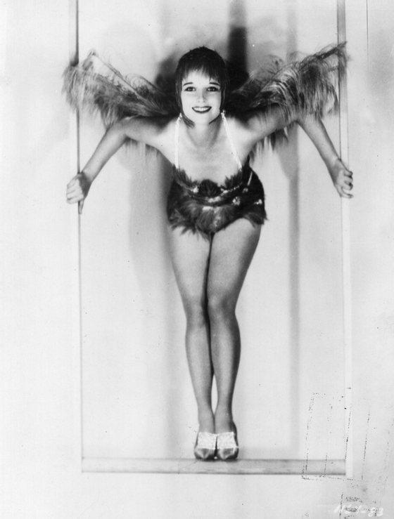 Louise Brooks (1900 - 1985), American film star on a trapeze which she had fitted into her Hollywood home. (Photo by General Photographic Agency/Getty Images)