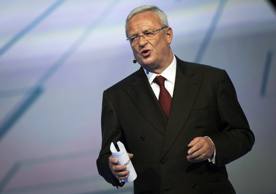 Volkswagen Group CEO Martin Winterkorn speaks at the launch of new vehicles from the car manufacturer at the Fraport arena prior to the 66th IAA auto show in Frankfurt am Main, western Germany on September 14, 2015. Volkswagen group showed their latest models and automotive concepts from the brands Volkswagen, Audi, Bentley, Bugatti, Ducati, Lamborghini, Porsche, Seat and Skoda. Hundreds of thousands of visitors are expected to crowd into the massive exhibition halls of Frankfurt's sprawling trade fair grounds later this week to catch a glimpse of the latest models and high tech innovations. AFP PHOTO / ODD ANDERSEN (Photo credit should read ODD ANDERSEN/AFP/Getty Images)