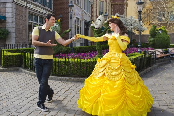 LAKE BUENA VISTA, FL - FEB 23: In this handout image provided by Disney, Tony Dovolani, one of the professional dancers starring on the ABC-TV series "Dancing with the Stars," joins Belle, the princess from Disney's "Beauty and the Beast," for a dance at the France pavilion in the Epcot theme park on February, 23 in Lake Buena Vista, Florida. The Albanian-born dancer will be back on the reality show when it makes its season premiere March 21, 2011 on ABC-TV. Epcot is one of four theme parks at Walt Disney World Resort in Florida. (Photo by Matt Stroshane/Disney via Getty Images)
