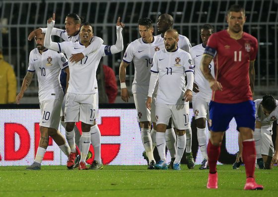 BELGRADE, SERBIA - OCTOBER 11: Nani (C) of Portugal celebrates scoring a goal with team mates Miguel Veloso (R) and Bruno Alves (L) during the Euro 2016 qualifying football match between Serbia and Portugal at the Stadium FC Partizan in Belgrade on October 11, 2015. (Photo by Srdjan Stevanovic/Getty Images)