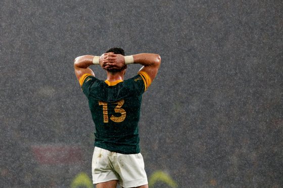 LONDON, ENGLAND - OCTOBER 24: Jesse Kriel of South Africa holds his head in his hands in dejection as the rain falls during the 2015 Rugby World Cup Semi Final match between South Africa and New Zealand at Twickenham Stadium on October 24, 2015 in London, United Kingdom. (Photo by Stu Forster/Getty Images)