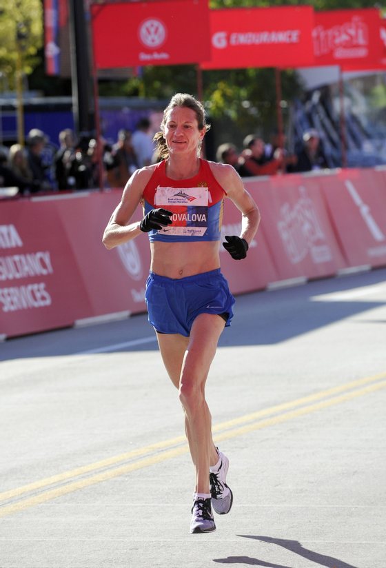 CHICAGO, IL - OCTOBER 13: Maria Konovalova finishes in third place in the women's race at the 2013 Bank of America Chicago Marathon on October 13, 2013 in Chicago, Illinois. (Photo by David Banks/Getty Images)