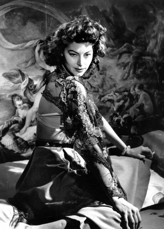 1950: Sensuous Hollywood star Ava Gardner (1922-1990) poses in front of a painted backdrop. She appeared in such films as 'The Killers' (1946) and 'The Barefoot Contessa' (1954) and retired to London in the 1980's. (Photo by Baron/Getty Images)