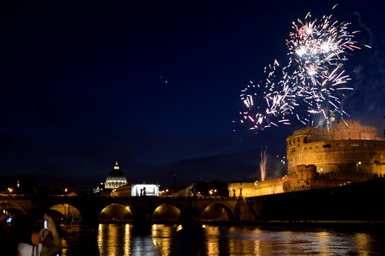 Fireworks burst in the sky over the Castel Sant'Angelo during the traditional 'Girandola', the feast of Romes patron St Peter and Paul, on June 29, 2015 in Rome. AFP PHOTO / TIZIANA FABI (Photo credit should read TIZIANA FABI/AFP/Getty Images)