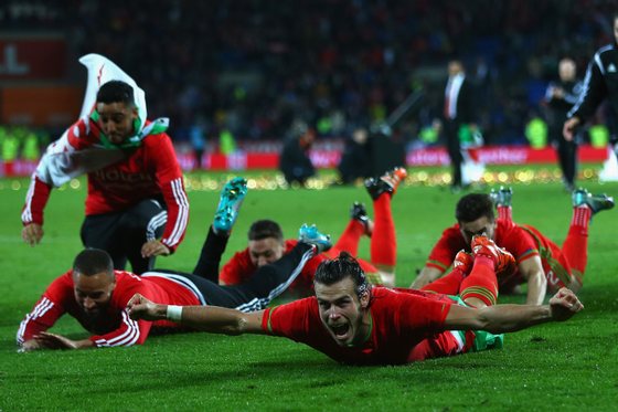CARDIFF, WALES - OCTOBER 13: Gareth Bale of Wales celebrates after his sides 2-0 victory and qualification during the UEFA EURO 2016 Qualifier match at the Cardiff City Stadium on October 13, 2015 in Cardiff, United Kingdom. (Photo by Michael Steele/Getty Images)