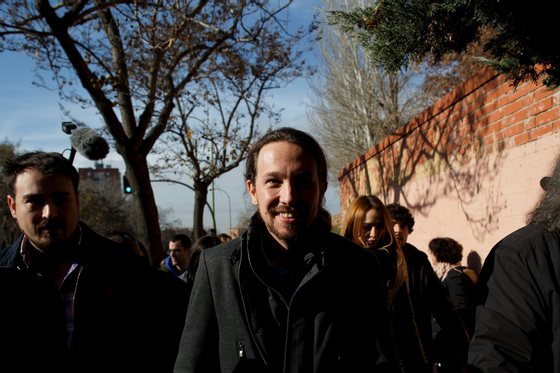 MADRID, SPAIN - DECEMBER 20: Podemos (We Can) leader Pablo Iglesias looks on as he walks after casting his vote at a polling station on December 20, 2015 in Madrid, Spain. Spaniards went to the polls today to vote for 350 members of the parliament and 208 senators. For the first time since 1982, the two traditional Spanish political parties, right-wing Partido Popular (People's Party) and centre-left wing Partido Socialista Obrero Espanol PSOE (Spanish Socialist Workers' Party), held a tight election race with two new contenders, Ciudadanos (Citizens) and Podemos (We Can) attracting right-leaning and left-leaning voters respectively. (Photo by Pablo Blazquez Dominguez/Getty Images)