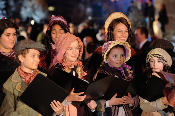 LONDON, ENGLAND - NOVEMBER 03: A choir sings christmas carols during for the World Film Premiere of Disney's 'A Christmas Carol' at the Odeon Leicester Square on November 3, 2009 in London, England. (Photo by Ian Gavan/Getty Images for Disney)