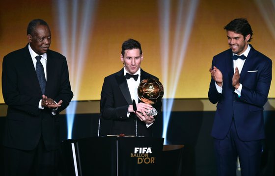 FC Barcelona and Argentina's forward  Lionel Messi (C) delivers a speech flanked by FIFA interim president Issa Hayatou (L) and Brazil and Orlando City midfielder Kaka after receiving the 2015 FIFA Ballon dOr award for player of the year during the 2015 FIFA Ballon d'Or award ceremony at the Kongresshaus in Zurich on January 11, 2016.   AFP PHOTO / FABRICE COFFRINI / AFP / FABRICE COFFRINI        (Photo credit should read FABRICE COFFRINI/AFP/Getty Images)