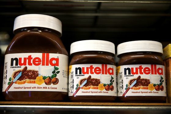 SAN FRANCISCO, CA - AUGUST 18: Jars of Nutella are displayed on a shelf at a market on August 18, 2014 in San Francisco, California. The threat of a Nutella shortage is looming after a March frost in Turkey destroyed nearly 70 percent of the hazelnut crops, the main ingredient in the popular chocolate spread. Turkey is the largest producer of hazelnuts in the world. (Photo by Justin Sullivan/Getty Images)