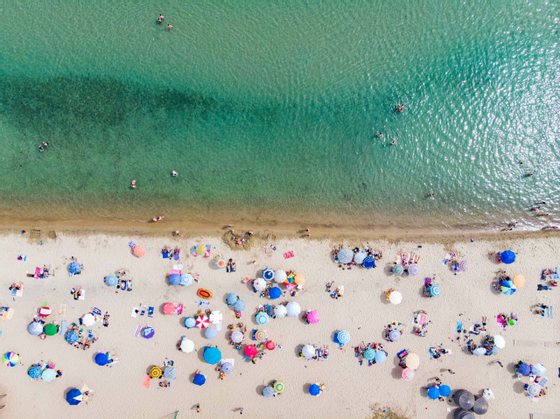 Drone View Of Crowded Beach During Covid-19 Easing Measures Era In Greece