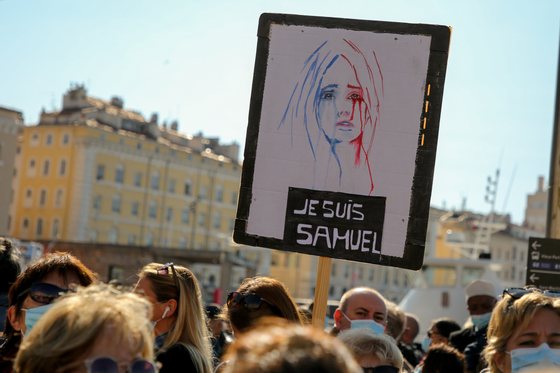 A protester holds a placard during the demonstration.