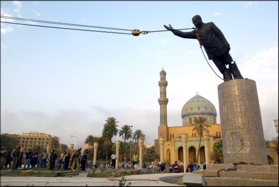 Operation Iraqi Freedom - Day 21: Us Troops Enter Central Baghdad And Topple Statue Of Saddam Hussein On April 9, 2003 In Baghdad, Iraq