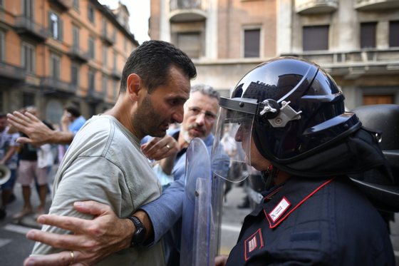 No Vax and Free Vax Demonstrators Protest At Introduction Of Italy's Green Pass