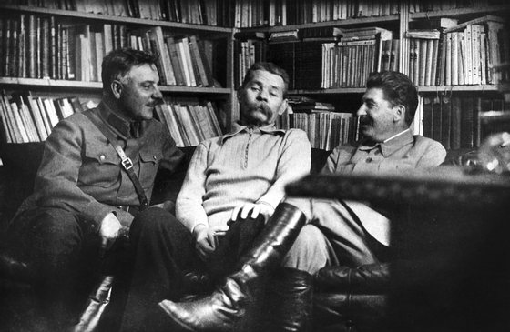 joseph stalin and kliment voroshilov visiting writer maxim gorky (center), 1931.