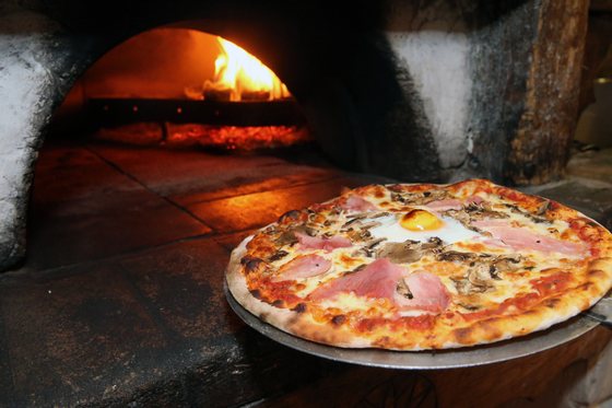Pizza tradicional em ItÃ¡lia