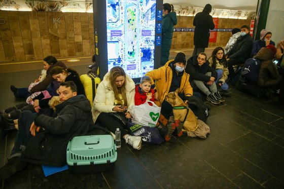 People take shelter in metro stations in Kyiv