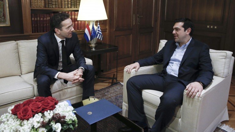 Jeroen Dijsselbloem, presidente do Eurogurpo, e Alexis Tsipras, primeiro-ministro da Grécia