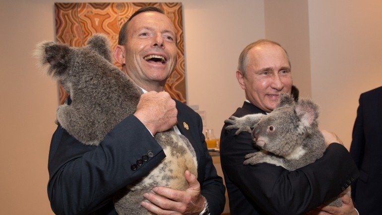 Tony Abbott, primeiro-ministro australiano e Vladimir Putin, um dos visados pela fuga de dados pessoais