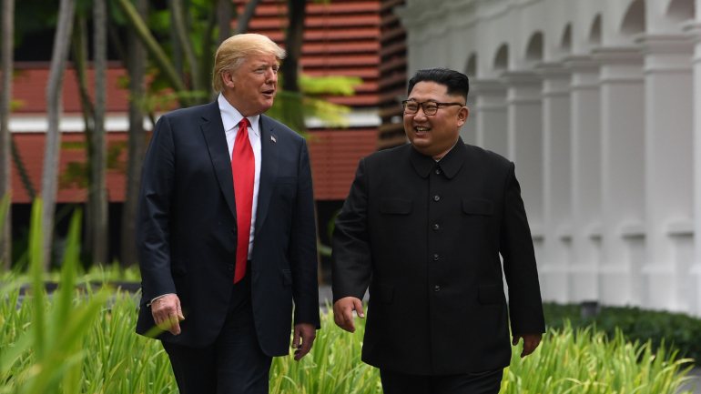 Donald Trump e Kim Jong Un durante a cimeira em Singapura, em 2018