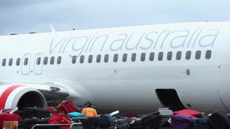 Os passageiros de um voo da Virgin Australia ficaram perturbados quando viram a notícia sobre a queda do avião que matou 157 pessoas