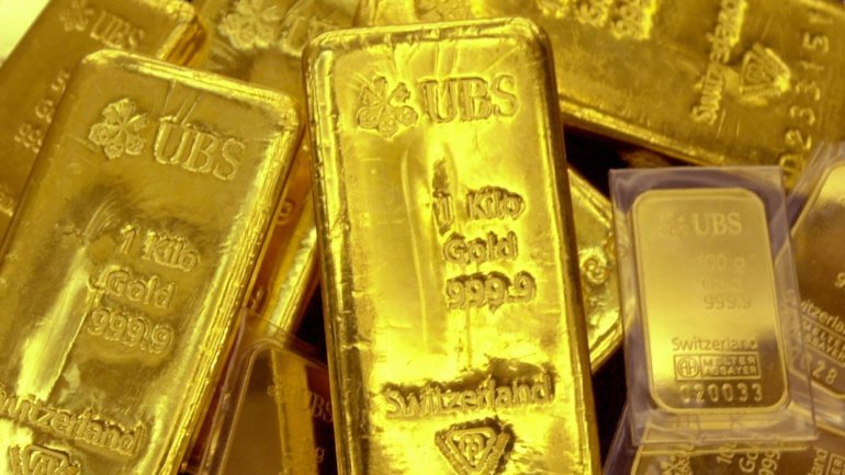 O que esconde o recorde na cotação do ouro, de quase 2.000 dólares. E até onde pode subir o metal precioso?