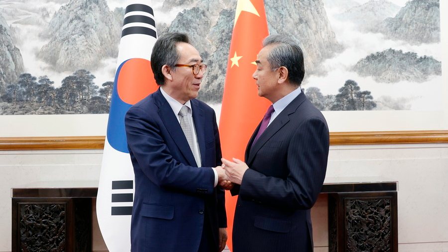 epa11338234 A handout photo made available by China&#039;s Foreign Ministry shows South Korean Foreign Minister Cho Tae-yul (L) greeting his Chinese counterpart, Wang Yi, prior to their talks at the Diaoyutai State Guesthouse in Beijing, China, 13 May 2024 (issued 14 May 2024).  EPA/CHINA FOREIGN MINISTRY / HANDOUT SOUTH KOREA OUT HANDOUT EDITORIAL USE ONLY/NO SALES HANDOUT EDITORIAL USE ONLY/NO SALES