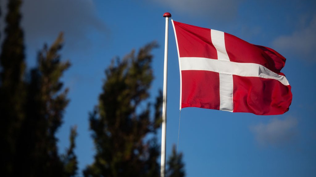 The Danish Flag Dannebro Flying In The Wind